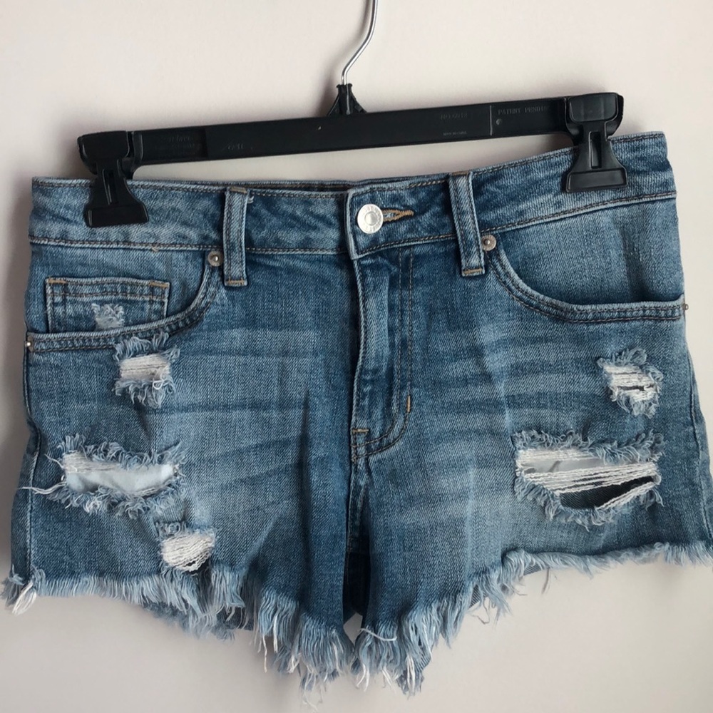 Distressed light wash denim shorts